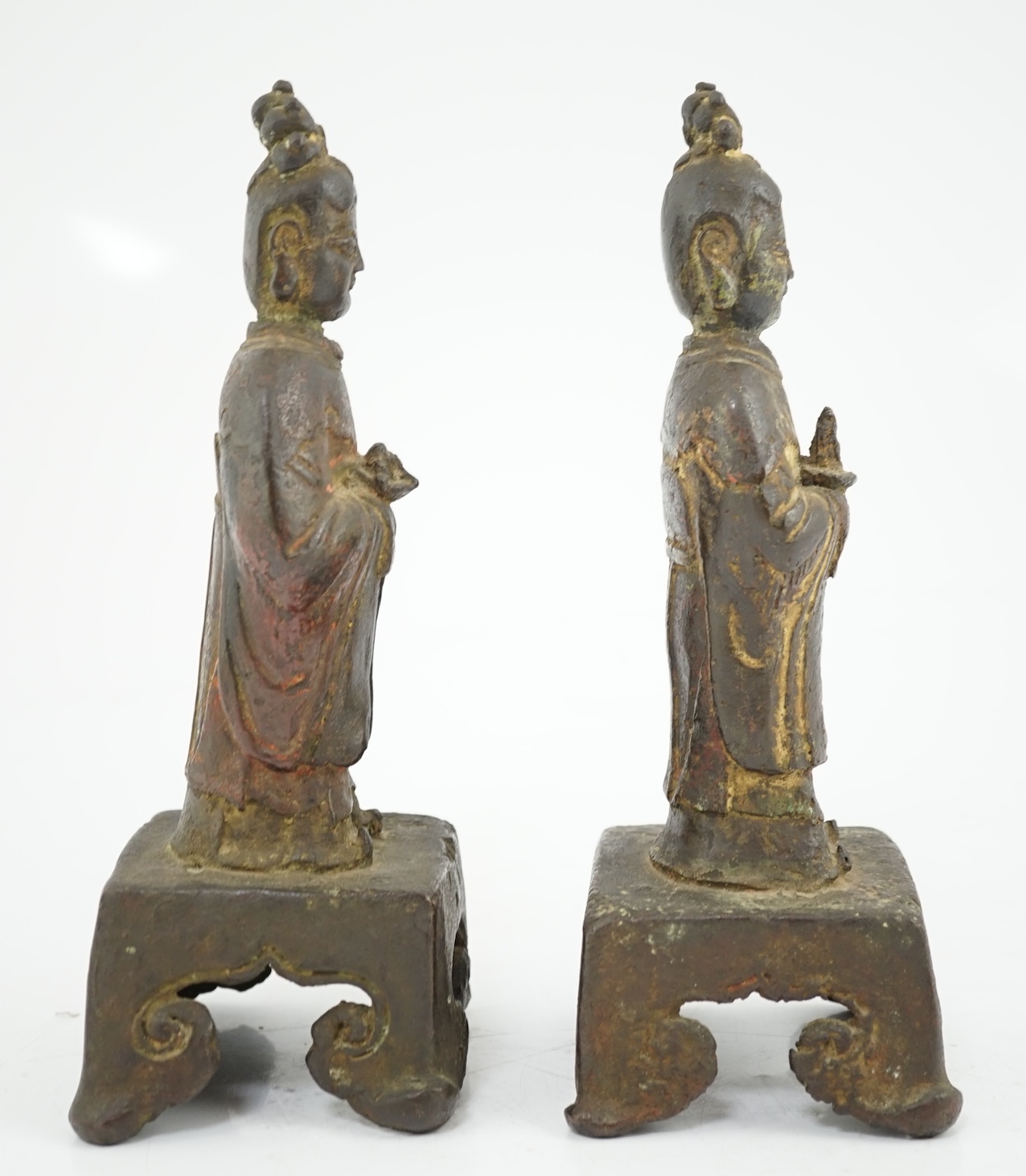 A pair of Chinese Ming bronze figures of attendants